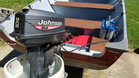 Lund 14 Foot Utility Fishing Boat With 25 Hp Johnson Outboard Motor