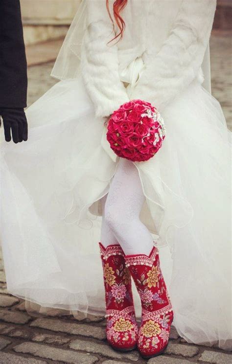 russian winter bride wearing valenki traditional high felted boots