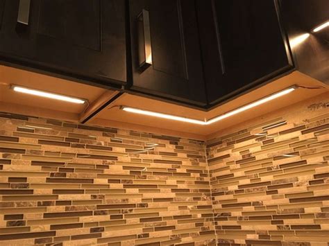 Even with the brightest overhead lights, wall cabinets can still block out some light and cast shadows on your work areas. How to Install Under-Cabinet Lighting | Hunker