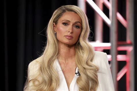 paris hilton unexpectedly became a mother and shared the first photo of her newborn just