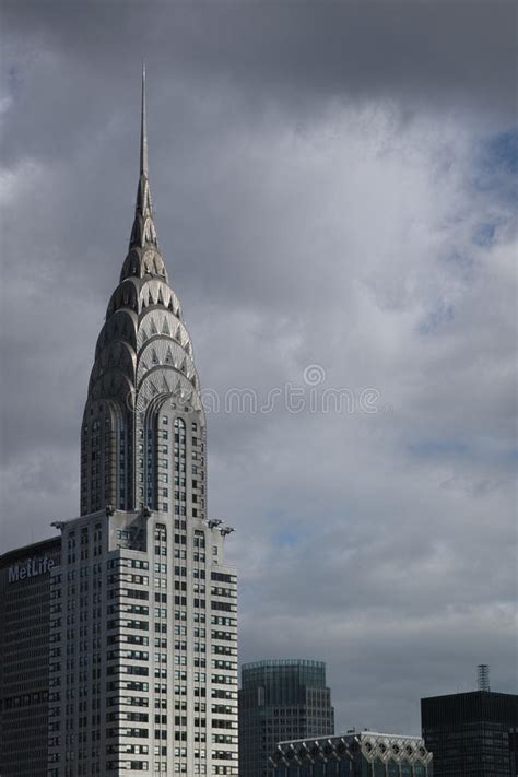 Top Of Chrysler Building With Dark Clouds Behind It Editorial Stock