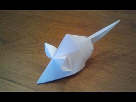 Then, take the corner and fold it down and back so the edge is perpendicular with the top, horizontal edge of the model. How To Make an Origami Mouse (Tetsuya Gotani) - YouTube