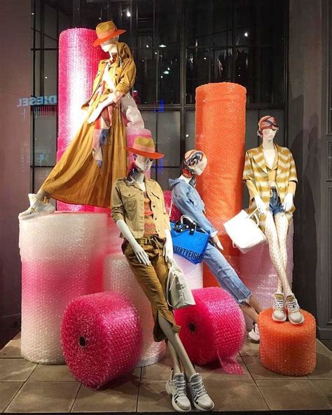 Beautiful Female Mannequins In A Gorgeous Colorful Window Display