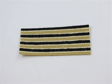 Logos appearing on this fabric are protected trademarks of university of michigan. Upholstery fabric: yellow/black striped cloth (yd ...