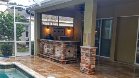 Beautiful Stonework Outdoor Kitchen And Fireplace Feature Creative