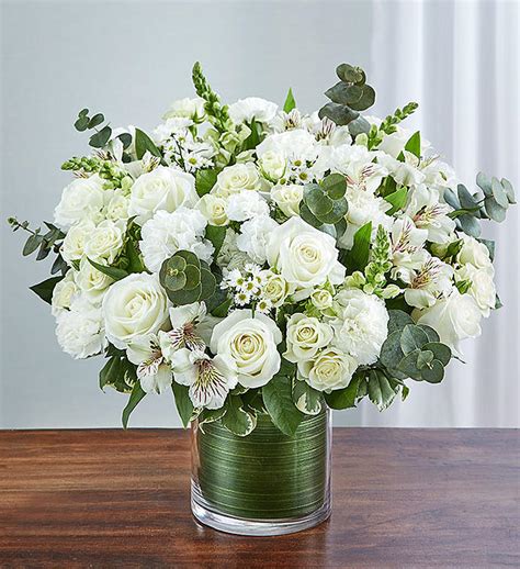 The perfect way to showcase your loved one's flowers. All White Flower Vase For Sympathy - Roslindale Florist