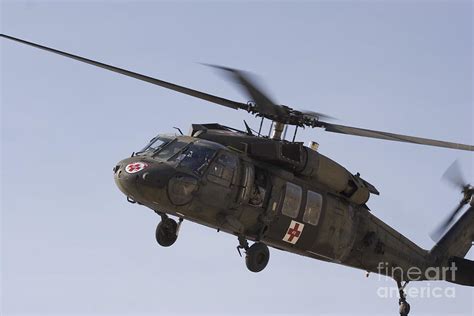 A Uh 60 Blackhawk Medivac Helicopter Photograph By Terry Moore