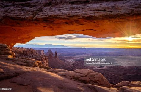 View Through Arch Mesa Arch At Sunrise Colorado River Canyon With The