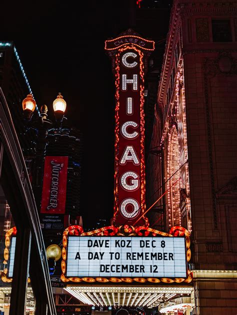 A Chicago Theater Sign Lit Up At Night Photo Free Urban Image On Unsplash