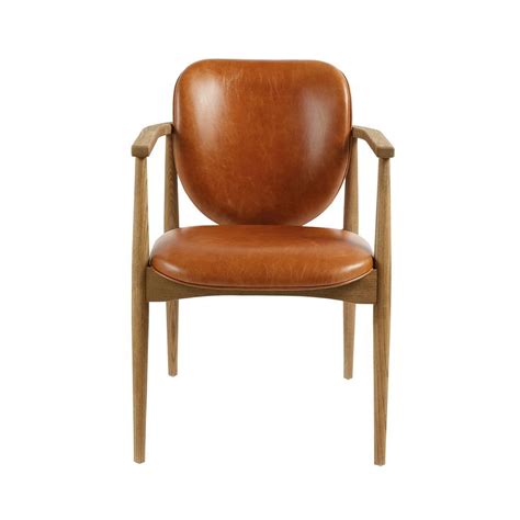 With a cool sling style and comfy channeled vegan leather, this is the type of chair that makes a statement. "The Melvin Armchair is the epitome of Mid-Century Modern ...