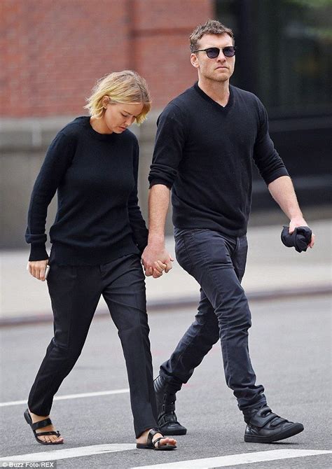 Lara Bingle And Sam Worthington Wear Matching Black Outfits In New York