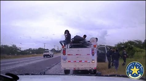 texas troopers apprehend 15 illegal immigrants seen on video fleeing work truck