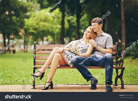 Happy Young Couple Sitting On Bench Stock Photo 343351550 Shutterstock