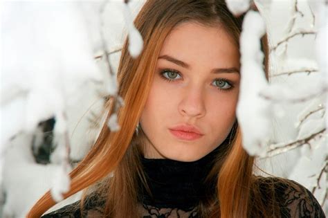 winter portrait of a beautiful girl among the snow free image download