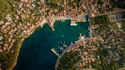Download Wallpaper 1920x1080 City Aerial View Roofs Coast Port Full