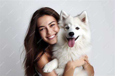 Premium Ai Image Young Adult Woman Holding Her Dog On White