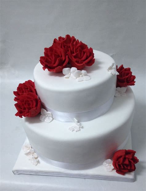 white wedding cake with red roses white wedding cake wedding cakes fondant cakes flower cake