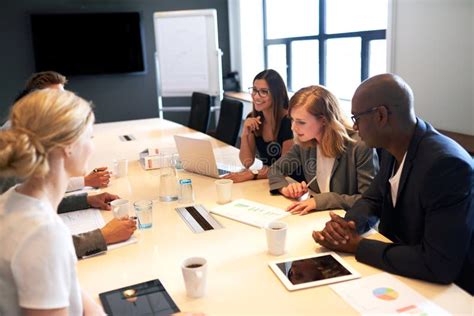 Group Of Young Executives Having A Work Meeting Stock Photo Image Of