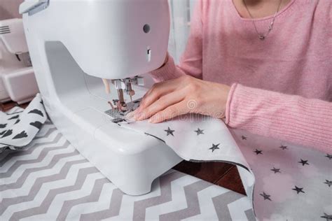 beautiful woman seamstress sew on the sewing machine clothes stock image image of handmade