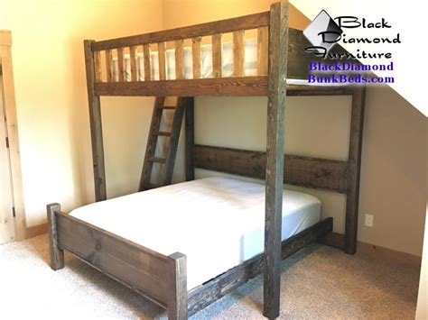 There are 2 ladders built right into the frame, one on each side. Promontory Custom Bunk Bed