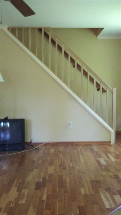 Let the glue dry and remove the painter's tape. How can I set up a removable stair railing? - Home ...