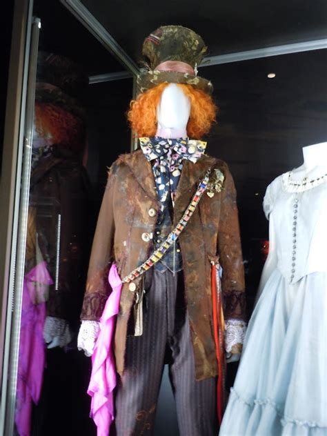 Hollywood Movie Costumes And Props Mad Hatter And Alice In Wonderland Costumes On Display