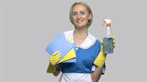 Young Smiling Cleaner Woman Young Pretty Woman Maid In Uniform Holding