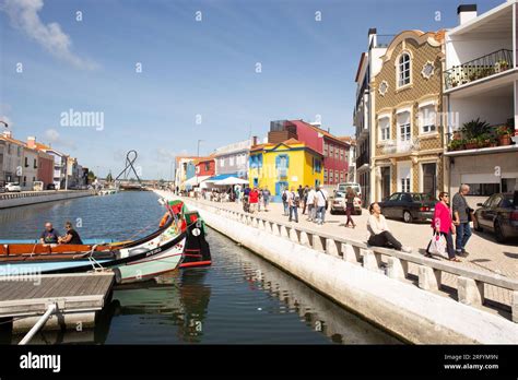 Aveiro's picturesque allure: Colorful canals, timeless azulejos, and