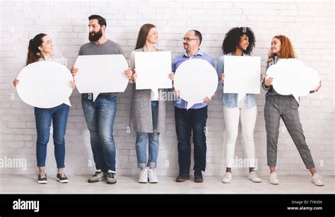 Group Of People Chatting With Speech Bubbles Stock Photo Alamy