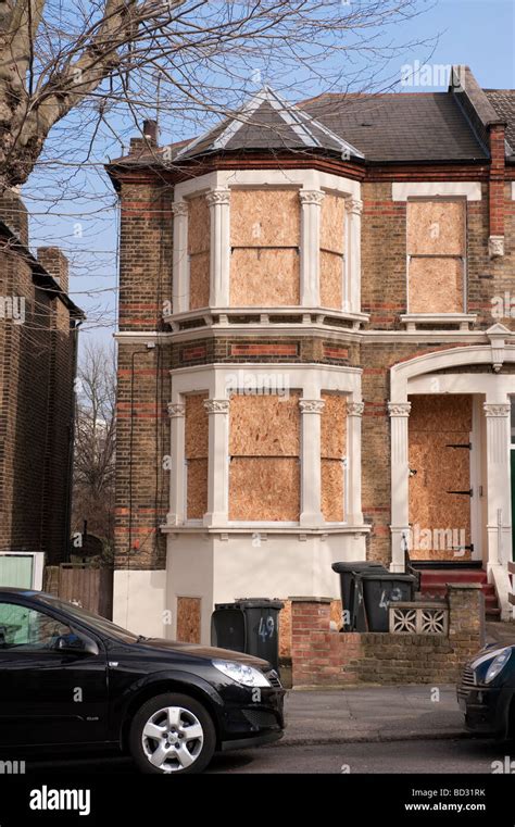 Boarded Up Semi Detached House In London Stock Photo Alamy