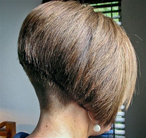 Smooth nape shave undercut short bob haircut buzzed nape woman getting very short haircut. Shaved nape best shaped bob | Прически, Стрижка