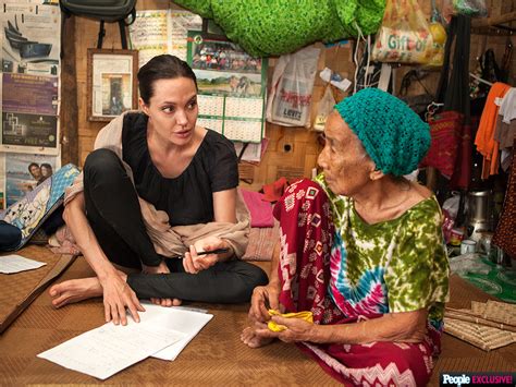 Angelina Jolie Pitt Meets Refugee In Myanmarl Photo