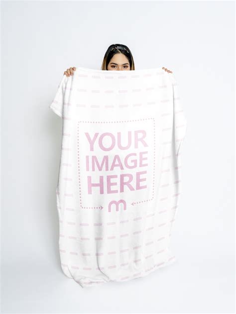 Mockup Of A Woman Peeking Behind A Blanket Mediamodifier