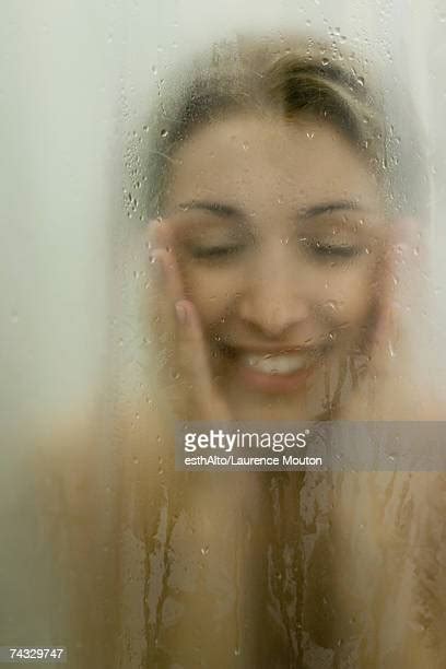Woman Behind Shower Curtain Photos And Premium High Res Pictures