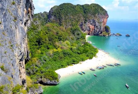 Aerial Overhead View Of Boats On Tropical Island Beach Surrounded By