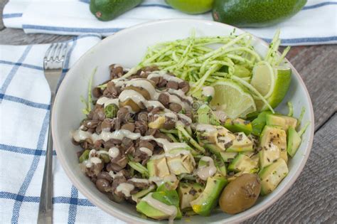 Eating a plate of them gets you closer to satisfying your daily requirement of veggies.) some zoodle recipes call for sautéing the zoodles, while others blanche them or leave them uncooked. Green Raw Vegan Zucchini Pasta With Lentils, Pesto Stock ...