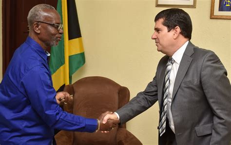 photos minister desmond mckenzie receives courtesy call from cuba s ambassador jamaica