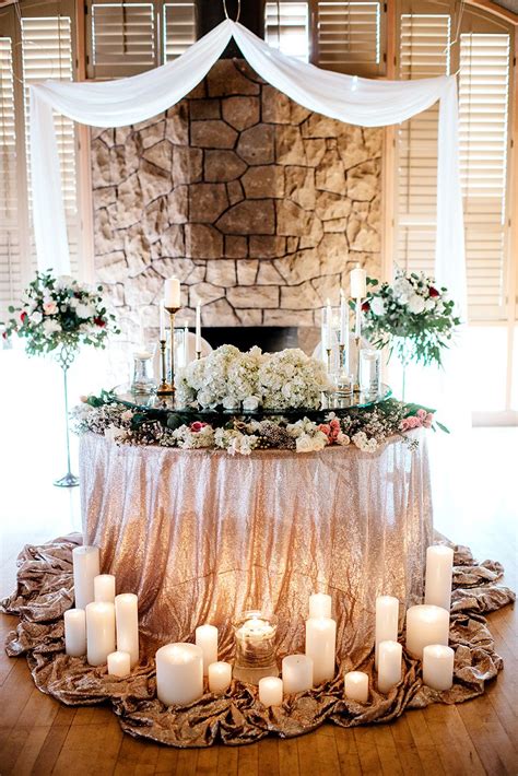 Gold Sequin Sweetheart Table Filled With White Hydrangea And Romantic