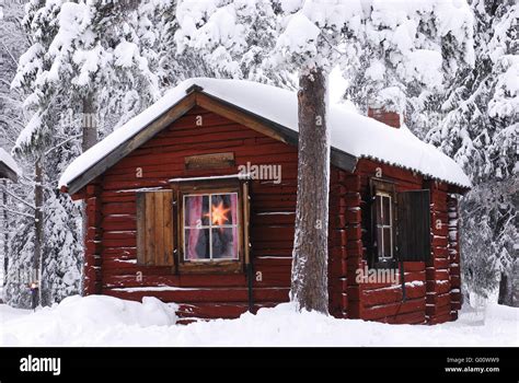 Cabin In Snowy Forest Stock Photo Alamy