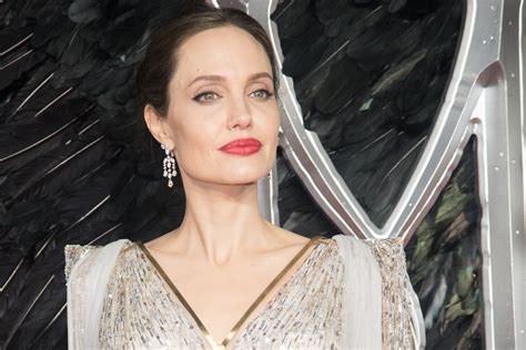 Angelina Jolies Height Outfits Feet Legs And Net Worth