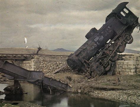 Destroyed Locomotive And Railroad Bridge In The Wake Of The Retreat Of