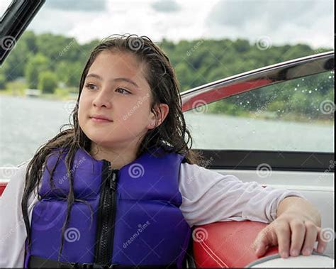 Twelve Year Old Amerasian Girl Enjoying A Boat Ride On Grand Lake In