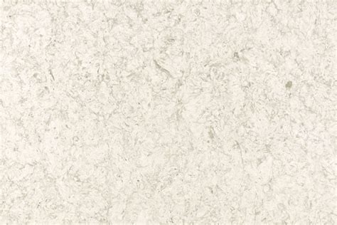 Portico cream quartz feature a cream background with mid darker tones swirling together. Portico Cream - Granitex Corp.