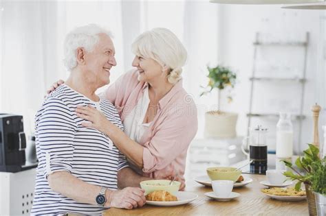 Smiling Senior Woman Hugging Husband Stock Photo Image Of Retirement