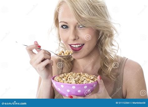 Happy Young Woman Eating Breakfast Cereals Stock Photo Image Of