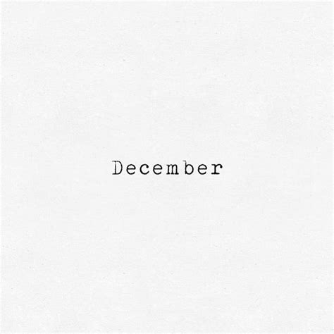 The Word December Written In Black Ink On White Paper