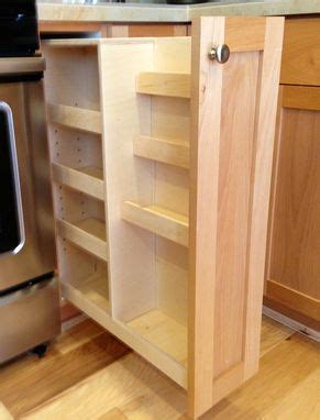 An organized spice rack makes cooking enjoyable and there are various ways to do it. Handmade Pull Out Spice Rack by Noble Brothers Custom ...