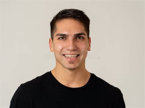 Portrait Of Attractive Cheerful Young Man With Smiling Happy Face