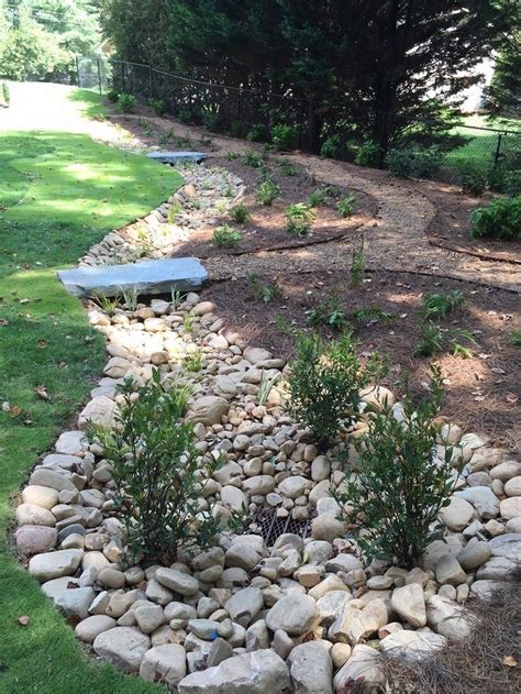dry riverbed landscape rock mix and edge plantings dry riverbed landscaping arranging