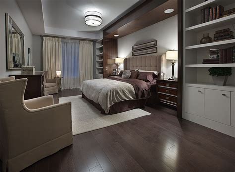 We love bedrooms that have wooden flooring but what we may not be aware about is that wooden floors also vary in stain and type too. The dark wood floors and millwork, accented by the neutral ...